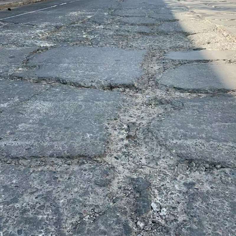 滴道路面起砂露石子修补料